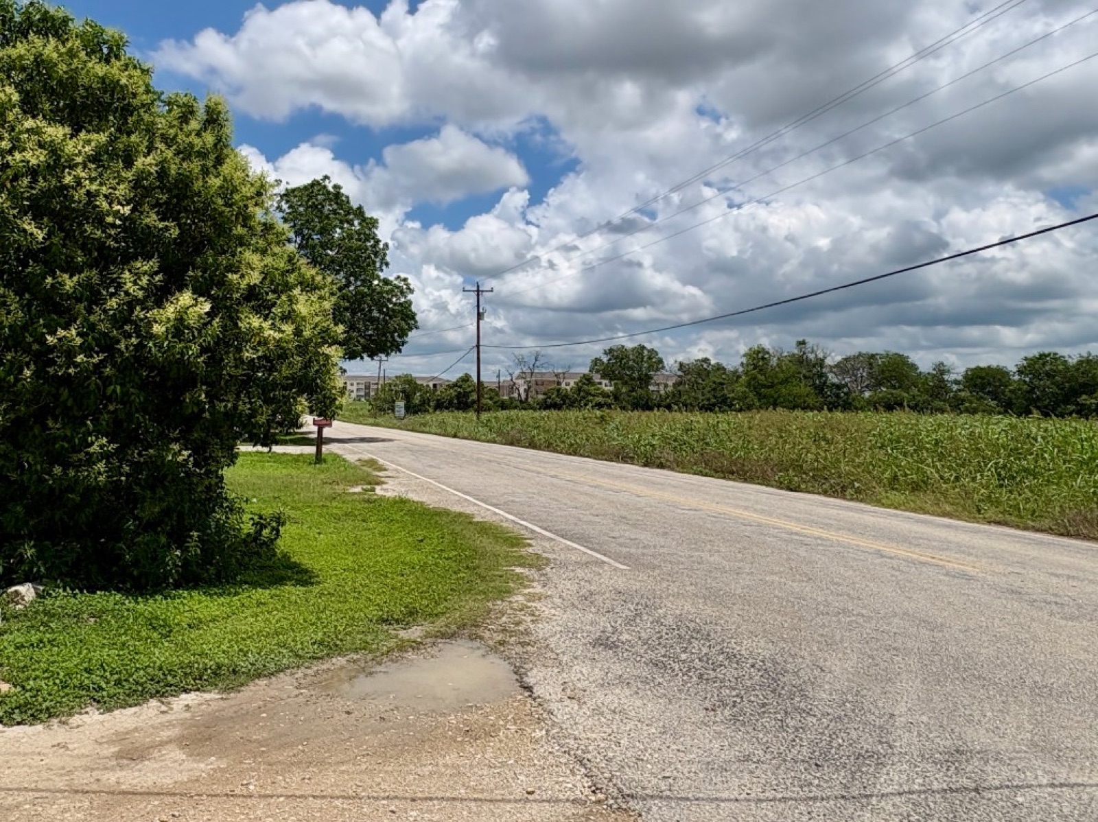 View from 1321 Harris Hill Road entrance toward Whispering Pointe Apartments