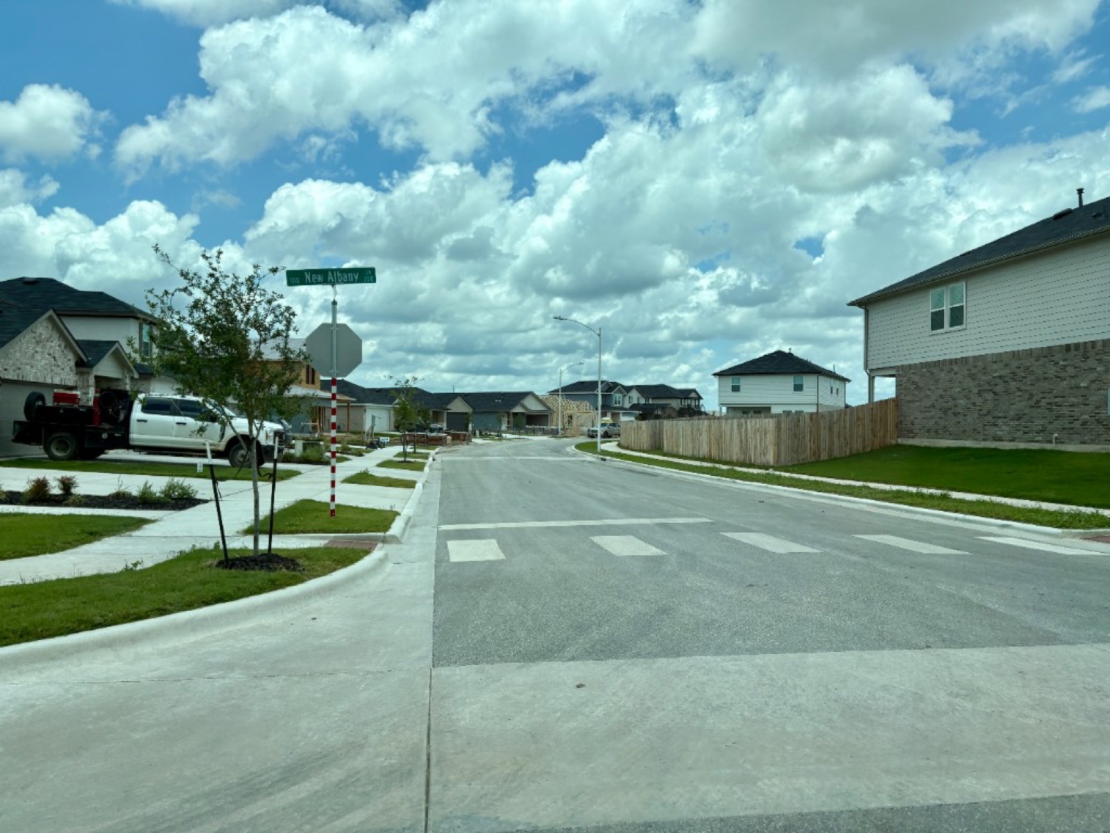 Another street in Whisper South with active construction